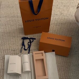 Louis Vuitton Orange Packaging with Blue Ribbon and Cream Inserts